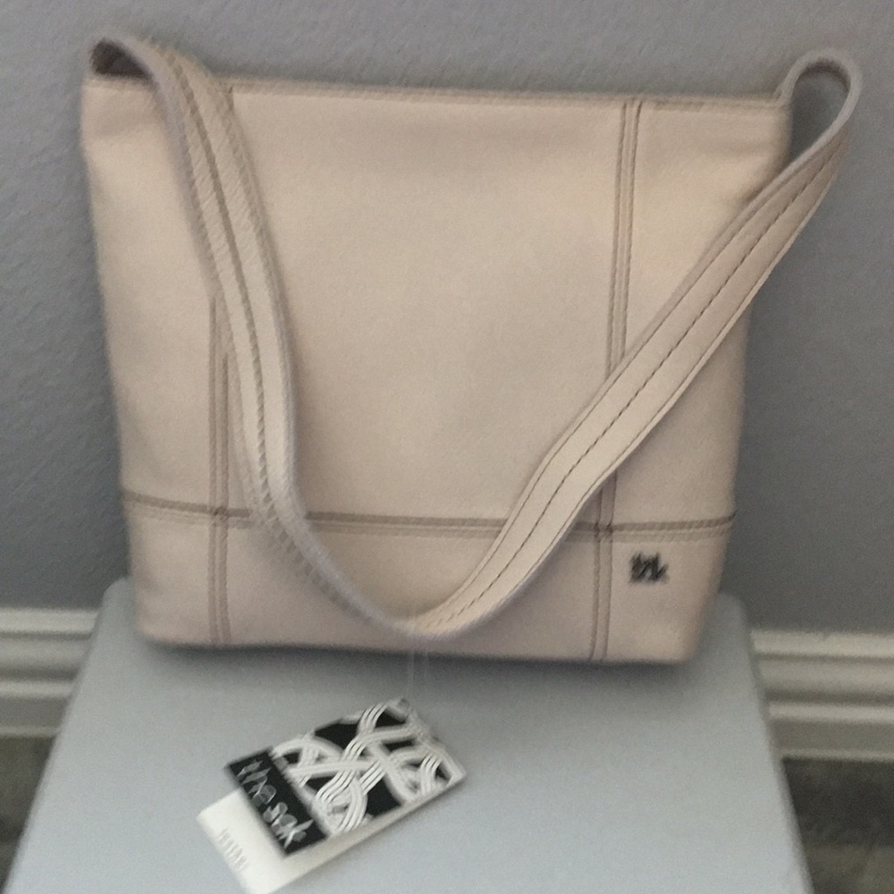 The Sak Genuine Leather purse mini hobo style.